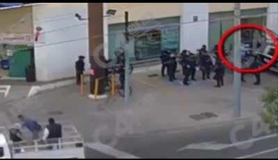 [Mexico] Idiot pharmacy robber didn't notice the shift change happening right next door