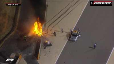 Medical car crew arriving on the scene and rushing in the flames