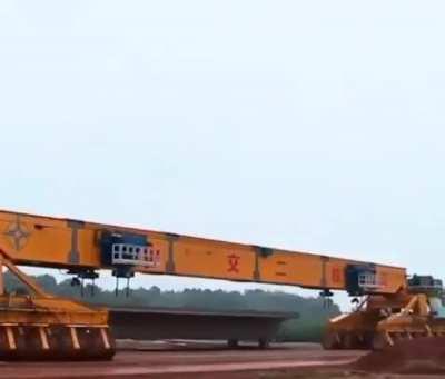 This vehicle that is used to place huge slabs in bridges