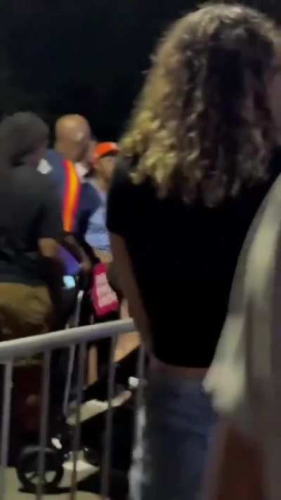 Deranged woman screams at a baby, onlookers find it funny.