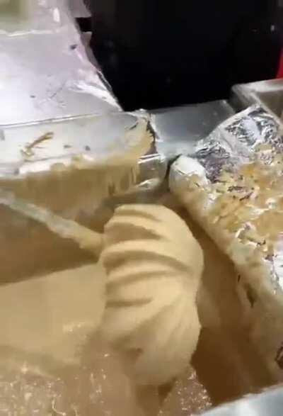 Making flower shaped fried onions