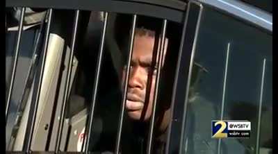 A Biden voter giving an interview from his office.