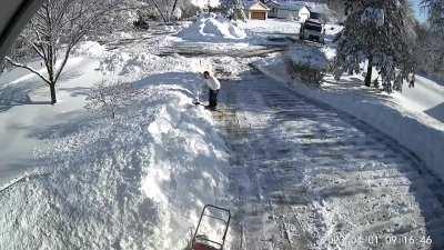 Thought I had finished plowing the driveway today in Minnesota after a foot of snow. Then the snowplow showed up and THIS happened.