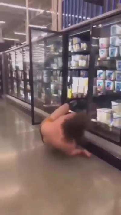 Man at walmart decides to go inside a walmart freesser.
