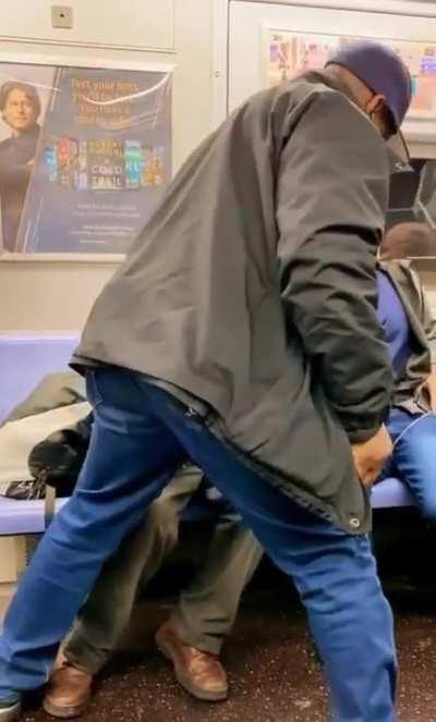 guy trying to pull scissors on a stranger