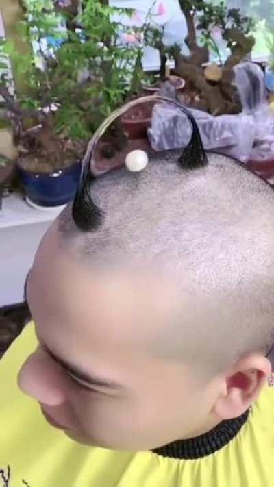 Flouting ball haircut