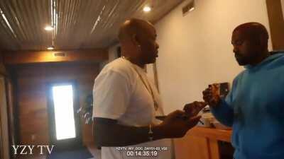 Mr West chows down his hamburger