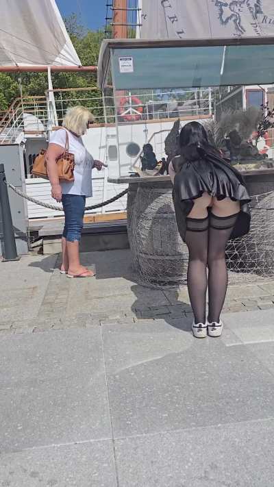 Dared to be a shameless tourist and enjoy the exhibition with stockings and no panties while others are around. (f)