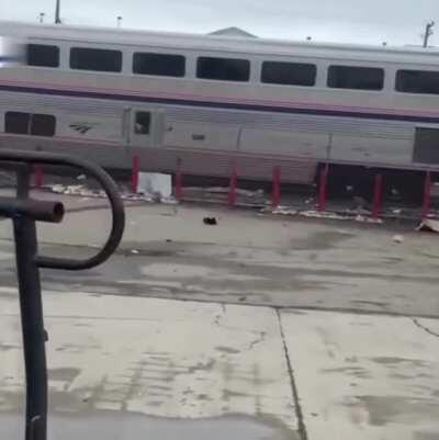 Video shows truck hit by train in Oakland, bursting into flames