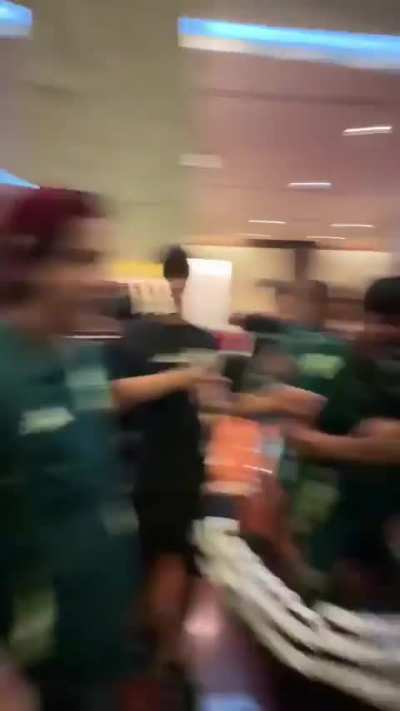 U-17 Japan team celebrating with U-17 Mexico team after their victory over Argentina in the U-17 World Cup