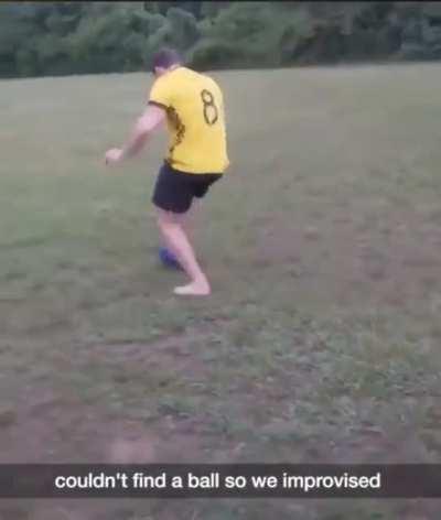 Playing football with a bowling ball