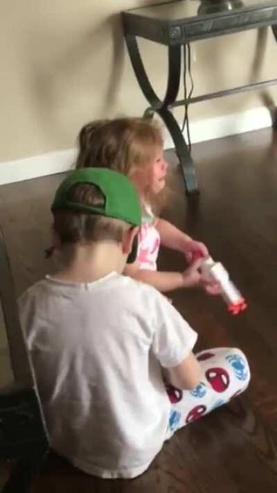 Crying girl gives herself more to cry about