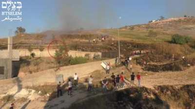 Israeli settlers & soldiers harass Palestinians at Asirah al-Qibliyah on May 14th - killing one Palestinian resident, Husam 'Asayrah, while injuring another. Such collaboration between soldiers & settlers is part of Israel’s unofficial policy to d