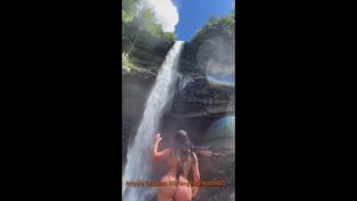 Playing in a waterfall