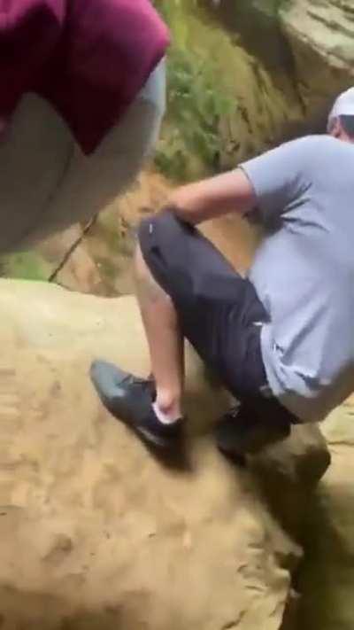 Guy gets caught carving his name into a rock at Ash Cave State Park in Ohio