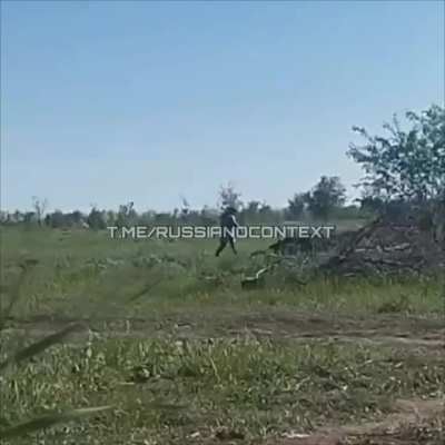 UA Pov - Russian sapper picks up anti-tank mine and throws its. Mine detonates