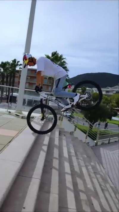 Cyclist Does Backwards Front Wheel Catwalk Down Stairs - Fluid camerawork in one sequence center framed