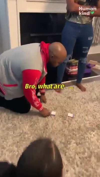 This wholesome surprise proposal during family night