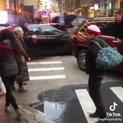 Driver: “I’m driving over here!” NYers: “I’m walking over here!”