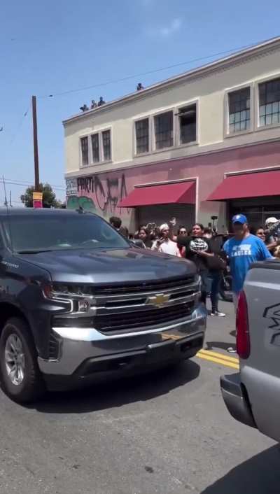 ICE/Federal Agents in full combat gear to counter community members during today’s ICE raid in LA