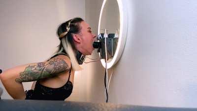 Sir keeps updating my deepthroat training set up, he felt my breaks between strokes were getting too long so he added an inflatable buttplug which he pumps up once for each second I spend without the dildo buried in my throat