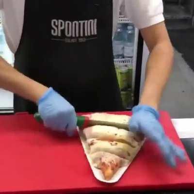 Interesting pizza slicer. I wonder how much time it saves.