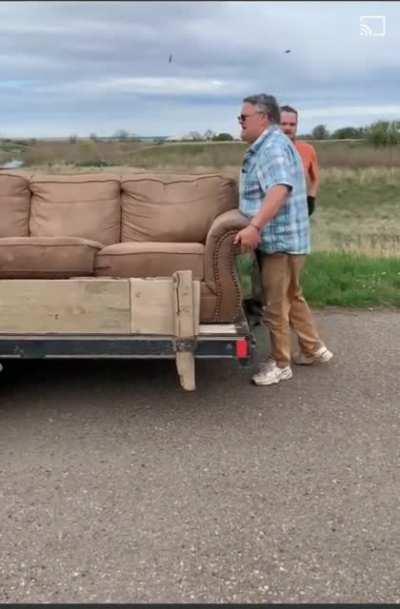 Man throws couch on side of road. Local man makes him pick it up.