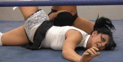 Chunky Cutie Leva Bates writhing in the ring in frilly panties