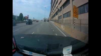 More Franklain st exit madness: Red van cuts off car and almost runs into jersey wall.