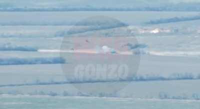 Close-up view of Ukrainian helicopter going down in Pervomaisk area. A rescue helicopter can be seen next to it. 2022