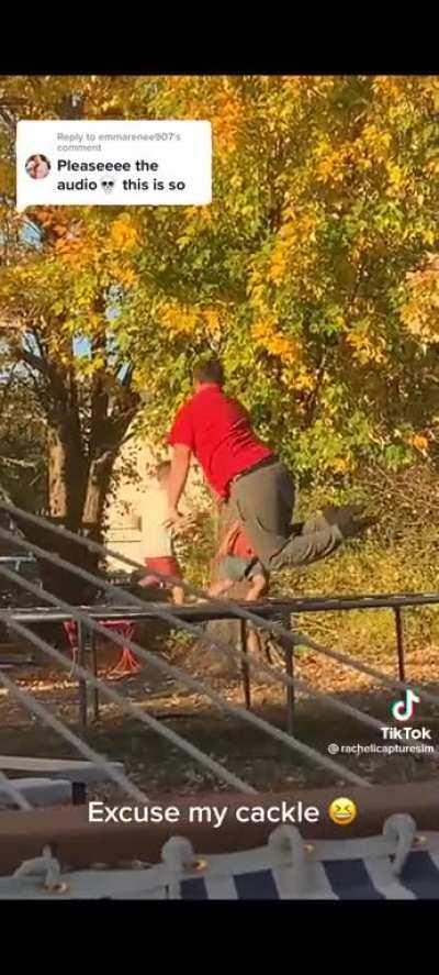 This dad playing on the trampoline