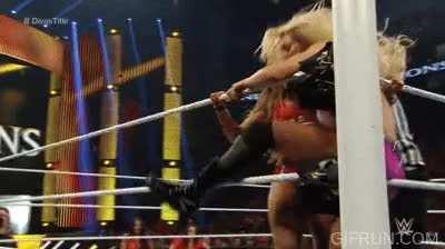Nikki Bella knees Charlotte between her legs