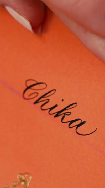 Steady hands and years of muscle memory. Satisfying pointed pen place cards