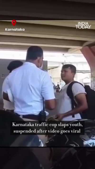 A viral video from Bengaluru shows a traffic cop slapping a biker during a heated argument, sparking outrage online. Captured by bystanders, the clip shows the officer losing his cool over an alleged traffic violation. Police have launched an inquiry afte