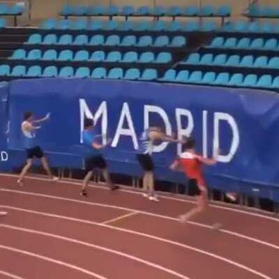 Runner slides under the stands