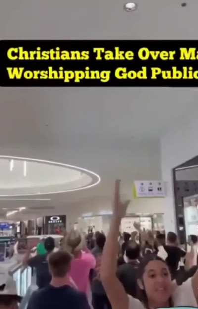 Christians hold a religious demonstration singing worship in a mall.