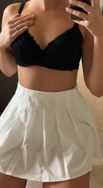 skinny little girl in skirt with cute juicy boobies