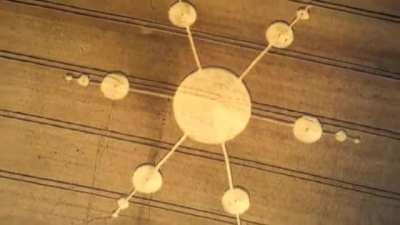 Only known video recording of the formation of a crop circle, including visible UFOs (1996).