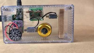 THE KLACKINATOR v1.0- When your keyboard isn't noisy enough. Caps Lock is speaker for now. Keys are wood block. Enter key is the Bell (still working on timing to make it ring) Lincoln heatsinks for the TIP120s. I am so going to piss off everyone at work w