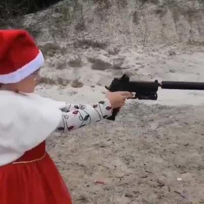 Child shooting a handgun