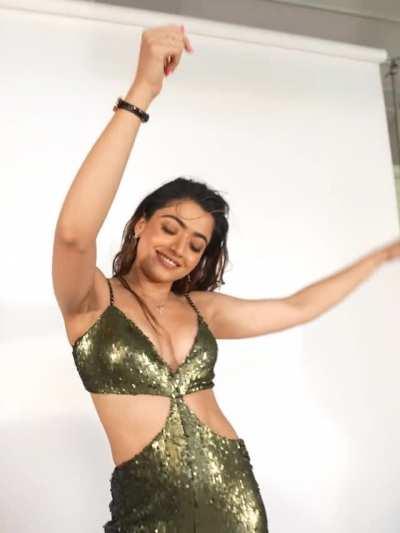 Rashmika Mandanna didn't let slip the opportunity to feature in PAN India Magazine easily as She show her Ripe Mangoes in Golden Dress with her Sweaty Armpits and In End that smirk on her Face while splitting her legs and then closing them while showing M