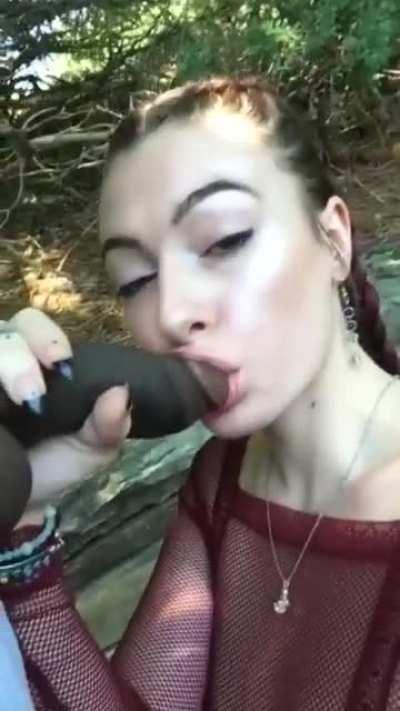 Sucking her boyfriend's dick on their hike [GIF]