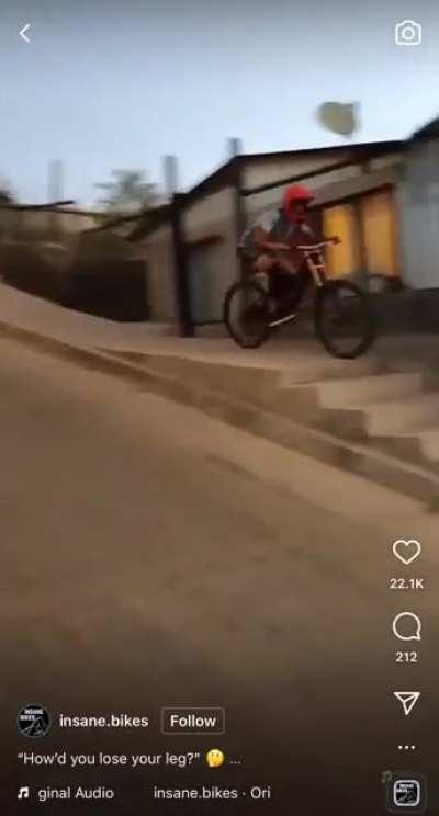 Dude bombing a hill on a bike eats shit