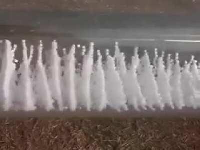 Response of foam particles to acoustic frequencies.