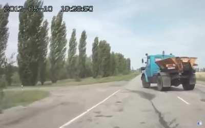 Russia: Blue truck cuts off author