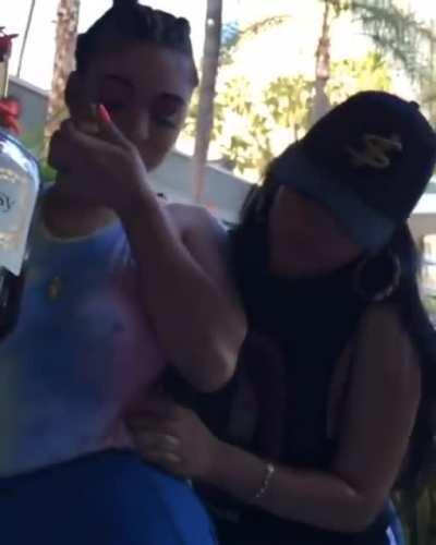 Swigging a bottle of Hennessy while your friend plays with your tits.