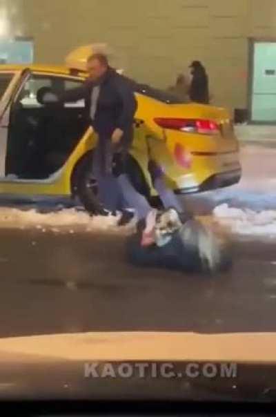Woman kicks a cab