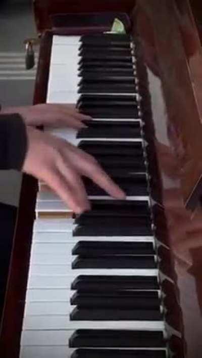 When the air raid warnings began, everyone was asked to move into the railway station. Alex refused to stop playing the piano, defiantly playing louder against the bomb sirens.