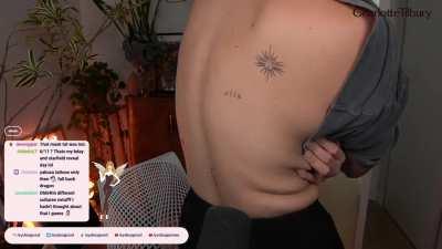 Guys this gem just happened in the stream ! Syd showing off her tattoos !