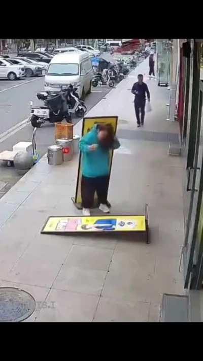 to walk past the sign